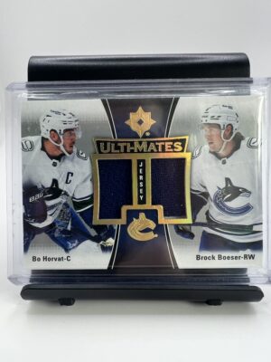 Bo Horvath & Brock Boeser - kousek dresu